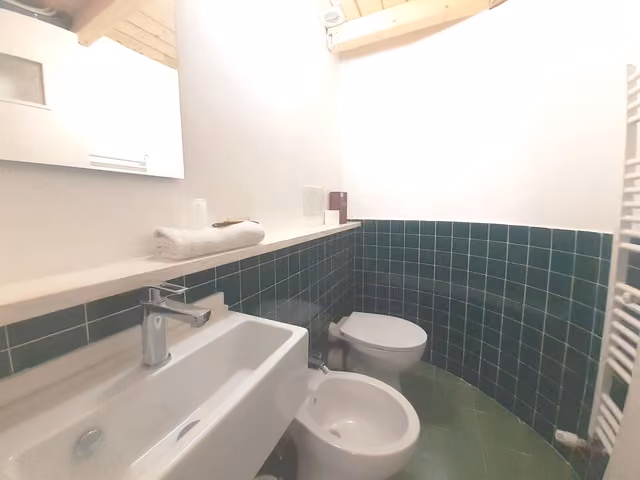 Bagno privato di una camera de Le Stanze del Corso